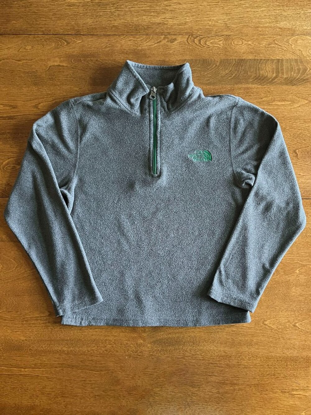 The North Face charcoal and green quarter-zip fleece S 7/8